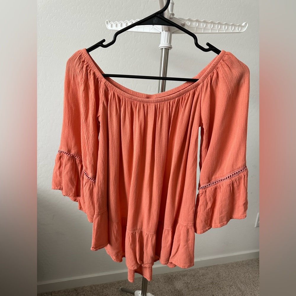 Over the shoulder peach color blouse
